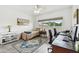 Bright bedroom featuring a work-station and ample natural light through large window at 2261 Swedish Dr # 47, Clearwater, FL 33763