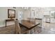 Inviting dining area with modern lighting and an open floor plan leading to a well-appointed kitchen at 2261 Swedish Dr # 47, Clearwater, FL 33763