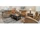 Inviting living room with leather sofas, a sleek coffee table, and a comfortable atmosphere at 2261 Swedish Dr # 47, Clearwater, FL 33763