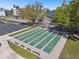 The shuffleboard courts in this community are surrounded by parking and meticulously kept landscaping at 2261 Swedish Dr # 47, Clearwater, FL 33763