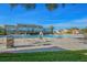 Community swimming pool with ample seating and a spacious deck, perfect for relaxation and recreation at 2261 Swedish Dr # 47, Clearwater, FL 33763