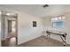 Neutral bedroom with carpet, window and air hockey table provides ample space for activities at 260 Venice East Blvd, Venice, FL 34293
