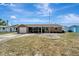 Single Gathering home with a well-manicured front yard and attached garage, offering comfort and curb appeal at 260 Venice East Blvd, Venice, FL 34293