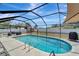 Gorgeous screened-in pool offering a refreshing escape with a meticulously maintained pool deck at 260 Venice East Blvd, Venice, FL 34293