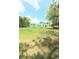 Charming green single story home with a well maintained backyard at 27752 Ravens Brook Rd, Wesley Chapel, FL 33544
