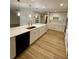 Modern kitchen with a large island and stainless steel appliances at 27752 Ravens Brook Rd, Wesley Chapel, FL 33544