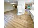 Open-concept living room showcasing floors and bright lighting at 27752 Ravens Brook Rd, Wesley Chapel, FL 33544