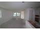 Bright, unfinished living room with large windows offering ample natural light at 2824 Marrakesh Ln, Sarasota, FL 34234