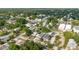 An aerial view of the home situated among lush greenery and other neighborhood residences at 2825 N Taliaferro N Ave, Tampa, FL 33602