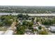 Neighborhood aerial view close to highway, showcasing a mix of residential houses and mature trees at 2825 N Taliaferro N Ave, Tampa, FL 33602