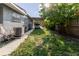 View of the driveway with an attached carport on a sunny day at 2825 N Taliaferro N Ave, Tampa, FL 33602