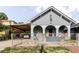 Charming bungalow-style home with a covered carport and front porch arches at 2825 N Taliaferro N Ave, Tampa, FL 33602