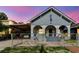 Charming bungalow-style home with a covered carport and front porch arches at 2825 N Taliaferro N Ave, Tampa, FL 33602