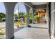 Covered front porch with arches offering an outdoor living space at 2825 N Taliaferro N Ave, Tampa, FL 33602