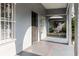 Covered front porch with arched openings provides curb appeal at 2825 N Taliaferro N Ave, Tampa, FL 33602