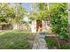 View of a shed in the backyard with a wooden fence at 2825 N Taliaferro N Ave, Tampa, FL 33602
