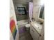 Clean bathroom with a shower and tub combination, plus a vanity with granite countertop at 3632 15Th S Ave, St Petersburg, FL 33711