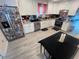 Well-lit kitchen featuring stainless steel appliances, white cabinetry, and ample counter space at 3632 15Th S Ave, St Petersburg, FL 33711