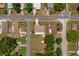 Aerial view of the property highlighting the house, yard, and surrounding neighborhood at 39243 6Th Ave, Zephyrhills, FL 33542