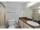 Bathroom featuring a vanity with storage and a shower with a glass door at 39243 6Th Ave, Zephyrhills, FL 33542