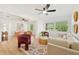 Bright living room with stylish decor, comfortable seating, and natural light at 4012 W Pearl Ave, Tampa, FL 33611