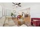Cozy living room featuring an open floor plan, modern decor, and plenty of seating at 4012 W Pearl Ave, Tampa, FL 33611