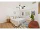 Bright main bedroom featuring a ceiling fan, natural lighting, and decor at 4012 W Pearl Ave, Tampa, FL 33611