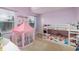 Bright bedroom with bunk beds and a play tent at 4301 5Th N Ave, St Petersburg, FL 33713