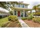Charming two-story home with a cozy front porch and well-maintained landscaping at 4301 5Th N Ave, St Petersburg, FL 33713