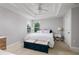 Bright bedroom with tray ceiling, ceiling fan, and neutral decor at 4301 5Th N Ave, St Petersburg, FL 33713