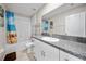 This bathroom features a single sink, a granite countertop, and a shower and tub with curtains at 4403 Eternal Prince, Sun City Center, FL 33573