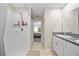 Bathroom featuring a walk-in shower, vanity with a single sink, and a modern mirror at 4403 Eternal Prince, Sun City Center, FL 33573