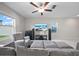 Comfortable living room with plush seating, large windows, and a modern entertainment center at 4403 Eternal Prince, Sun City Center, FL 33573