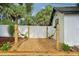 A tranquil hammock area with two hammocks and pea gravel is perfect for unwinding in the outdoors at 4609 S Lois Ave, Tampa, FL 33611