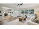 Inviting living room with seamless access to a stylish, updated kitchen at 4609 S Lois Ave, Tampa, FL 33611