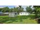 Spacious backyard with a storage shed and ample room for landscaping at 4754 17Th St, Zephyrhills, FL 33542