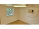 Neutral-colored room with natural light and an installed air conditioning unit at 4754 17Th St, Zephyrhills, FL 33542