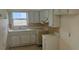 Functional kitchen featuring ample counter space and classic cabinetry at 4754 17Th St, Zephyrhills, FL 33542