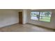 Inviting living room with natural light and a simple, classic design at 4754 17Th St, Zephyrhills, FL 33542