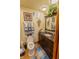 Well-lit bathroom featuring a vanity with a dark wood finish and decorative accessories at 502 Dewolf Rd, Brandon, FL 33511