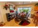 Kitchen dining area with a dining table and bay window that fills the space with natural light at 502 Dewolf Rd, Brandon, FL 33511