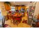 A traditionally styled kitchen featuring an island, stainless steel appliances, and tile flooring at 502 Dewolf Rd, Brandon, FL 33511