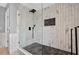 Modern bathroom features an updated glass enclosed shower with a sleek, contemporary design at 511 Island Way, Clearwater Beach, FL 33767