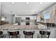 Modern kitchen with granite countertops, stainless steel appliances, and ample cabinet space at 511 Island Way, Clearwater Beach, FL 33767