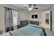 This bedroom features a ceiling fan and is freshly painted at 5117 Whispering Leaf Trl, Valrico, FL 33596