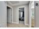 Hallway with a view to the bedroom and the bathroom at 5117 Whispering Leaf Trl, Valrico, FL 33596