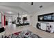 Spacious living room with seamless flow to the kitchen features modern design elements and an open concept layout at 5117 Whispering Leaf Trl, Valrico, FL 33596