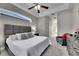 Spacious main bedroom offers a luxurious retreat with an ensuite bathroom and ample natural light at 5117 Whispering Leaf Trl, Valrico, FL 33596