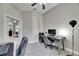 A shared office space with a stylish desk and comfortable seating at 5117 Whispering Leaf Trl, Valrico, FL 33596