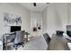 Shared office space with two desks and access to a dining area at 5117 Whispering Leaf Trl, Valrico, FL 33596